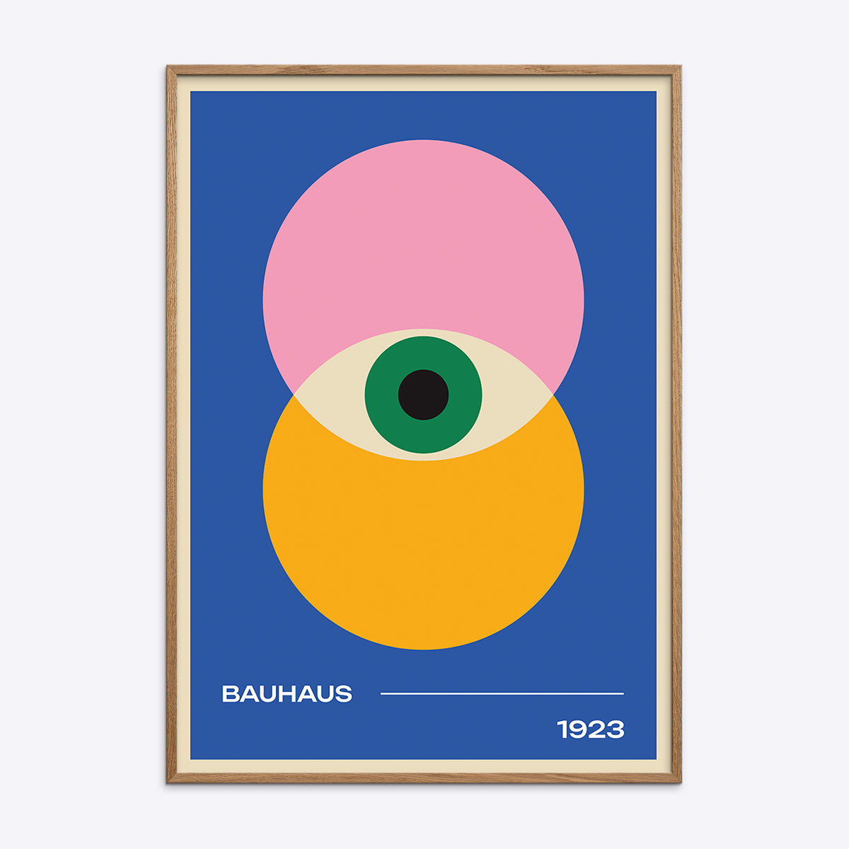 Bauhaus plakat i træramme med geometrisk design i blå, pink, gul og grøn.