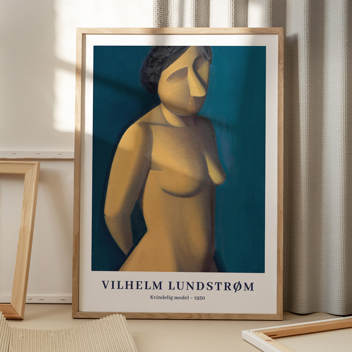Plakat af Vilhelm Lundstrøm med titlen "Kvinde i model" fra 1930, placeret på et gulv med skygge fra et vindue.