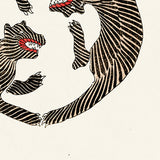Illustration af to stiliserede tigre i sort og hvid med røde detaljer, der danner en cirkulær komposition.