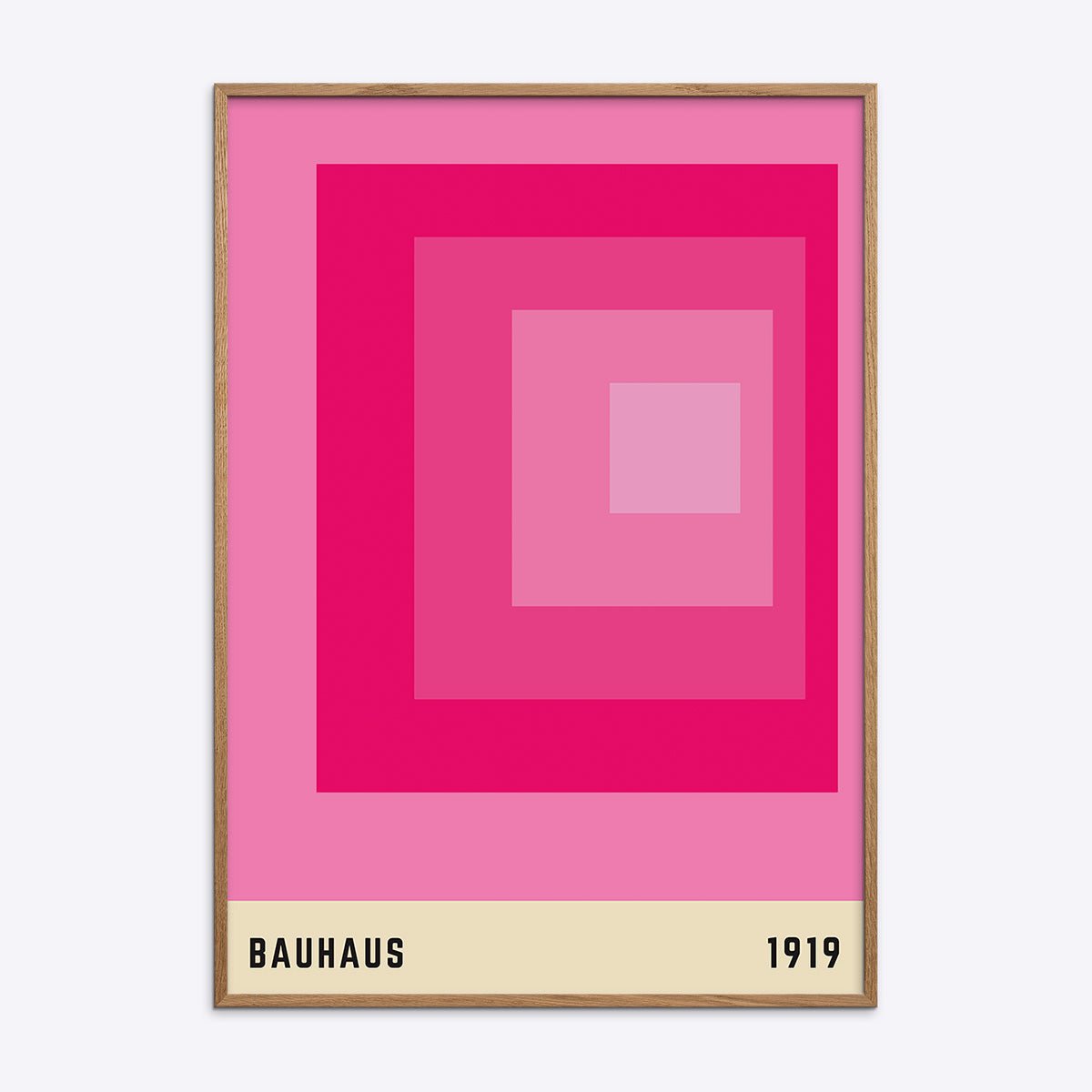 Bauhaus plakat i pink med geometriske former i træramme, ideel til moderne indretning og kunstelskere.