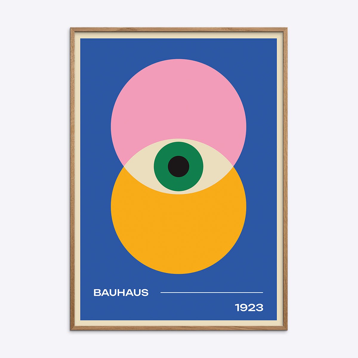 Bauhaus plakat i træramme med geometrisk design i blå, pink, gul og grøn.
