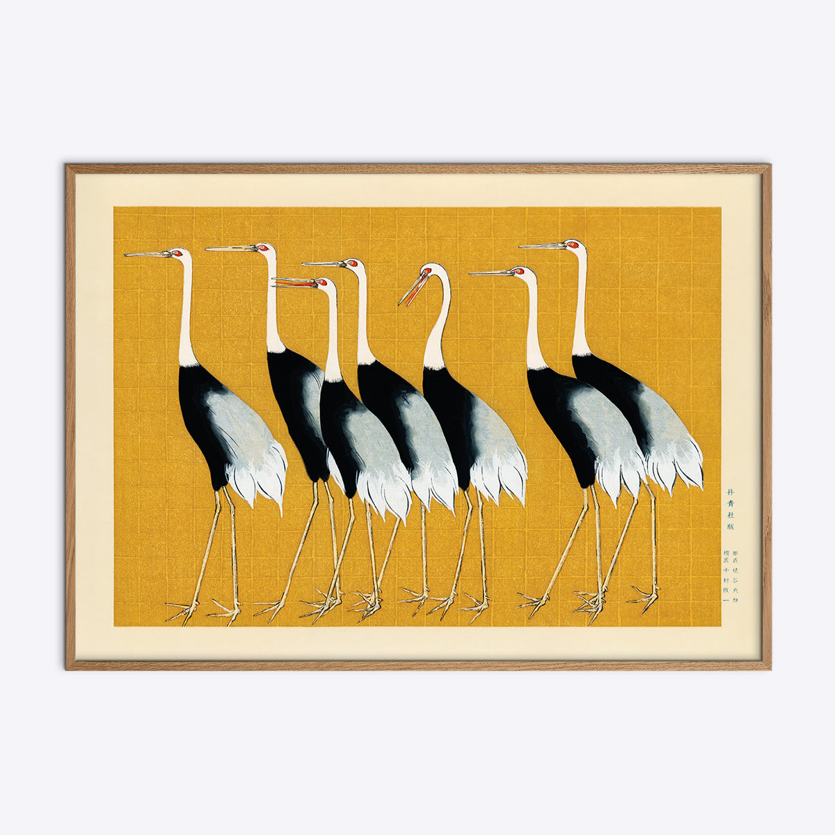 Plakat med illustration af traner på gul baggrund, indrammet i naturtræsramme.