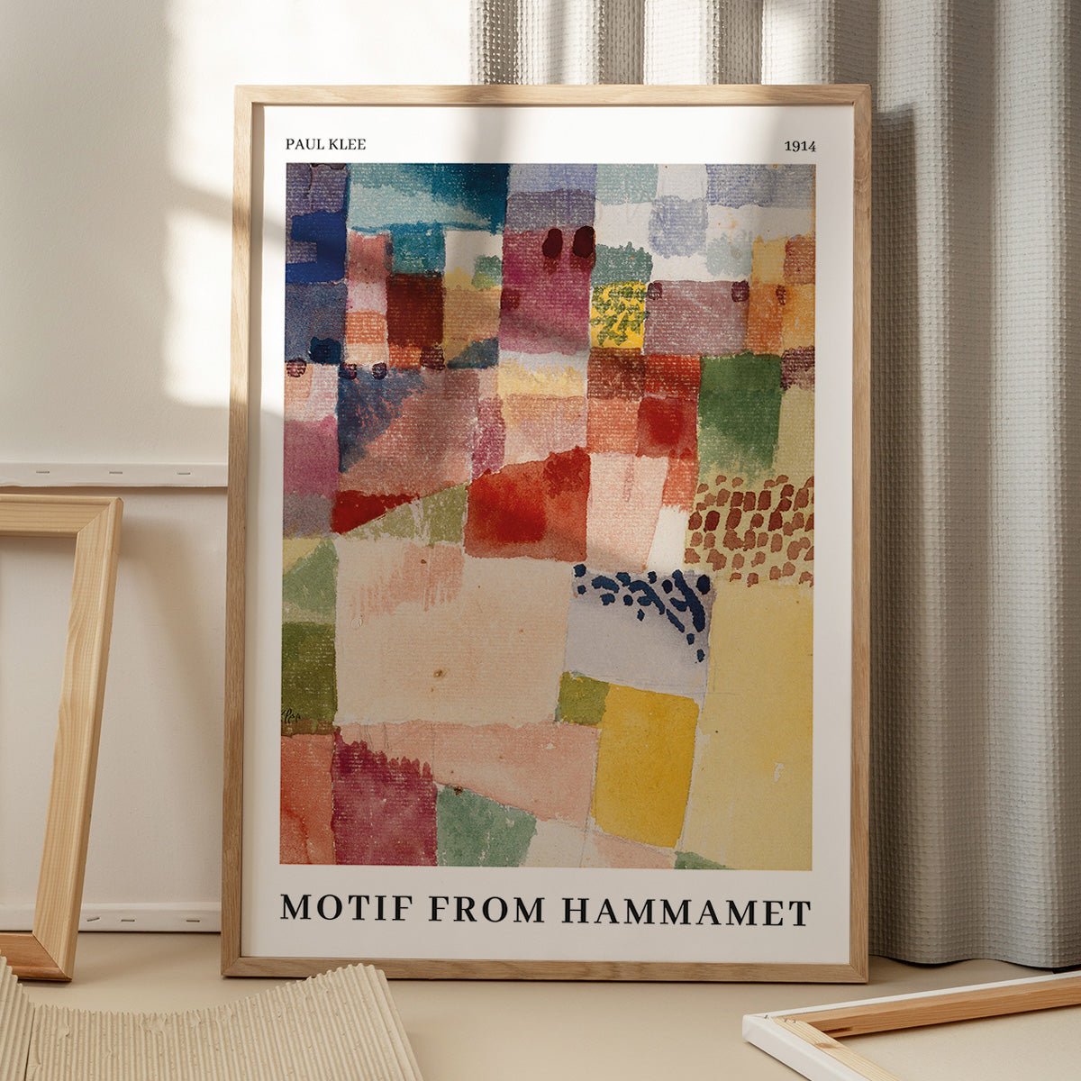 Paul Klee "Motif from Hammamet" plakat på gulv med vinduesskygge.