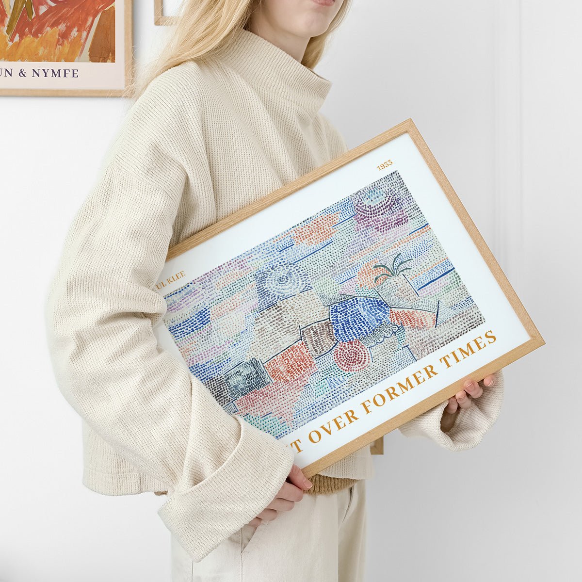 Plakat af Paul Klee med abstrakte former og lyse farver, der skaber en drømmende atmosfære.